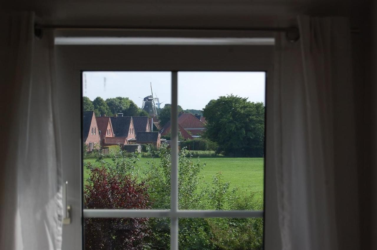 Ferienwohnung Im Gulfhof Krummhörn Exterior foto